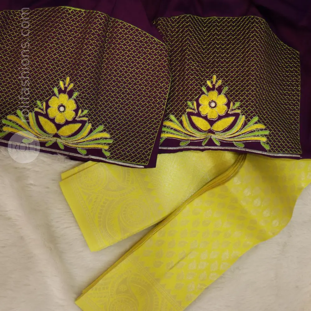 Yellow saree with deep purple blouse