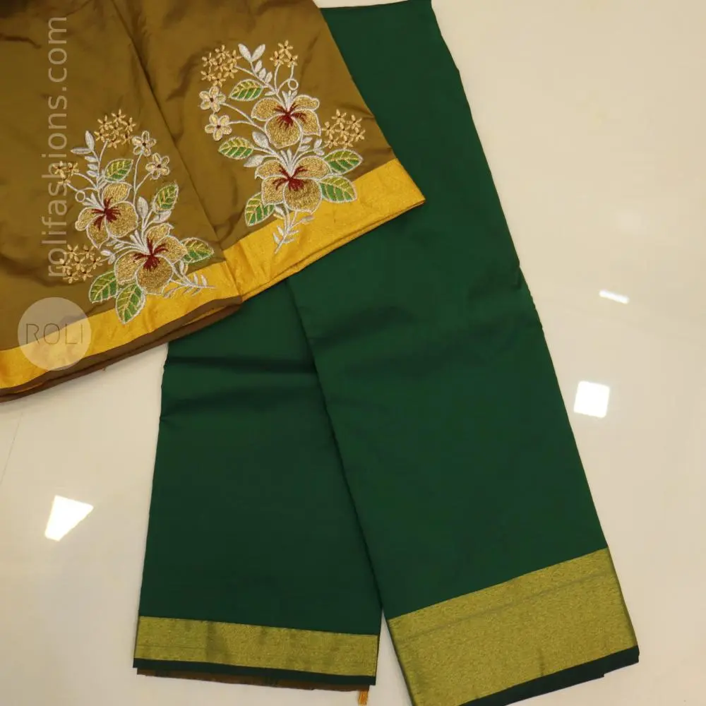 Bottle green saree with dried mehendhi blouse