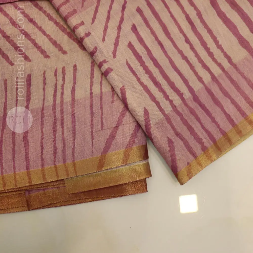 Shades of mauve, lilac, and dusty pink: