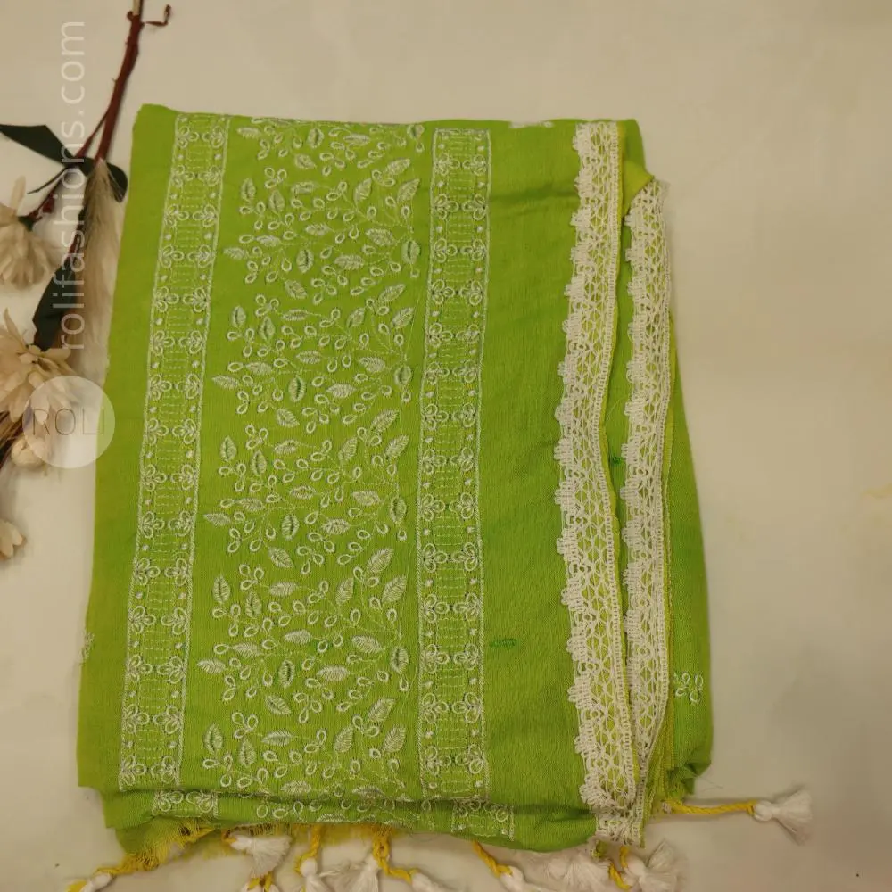 Parrot green saree with lace edges and allover embroidery