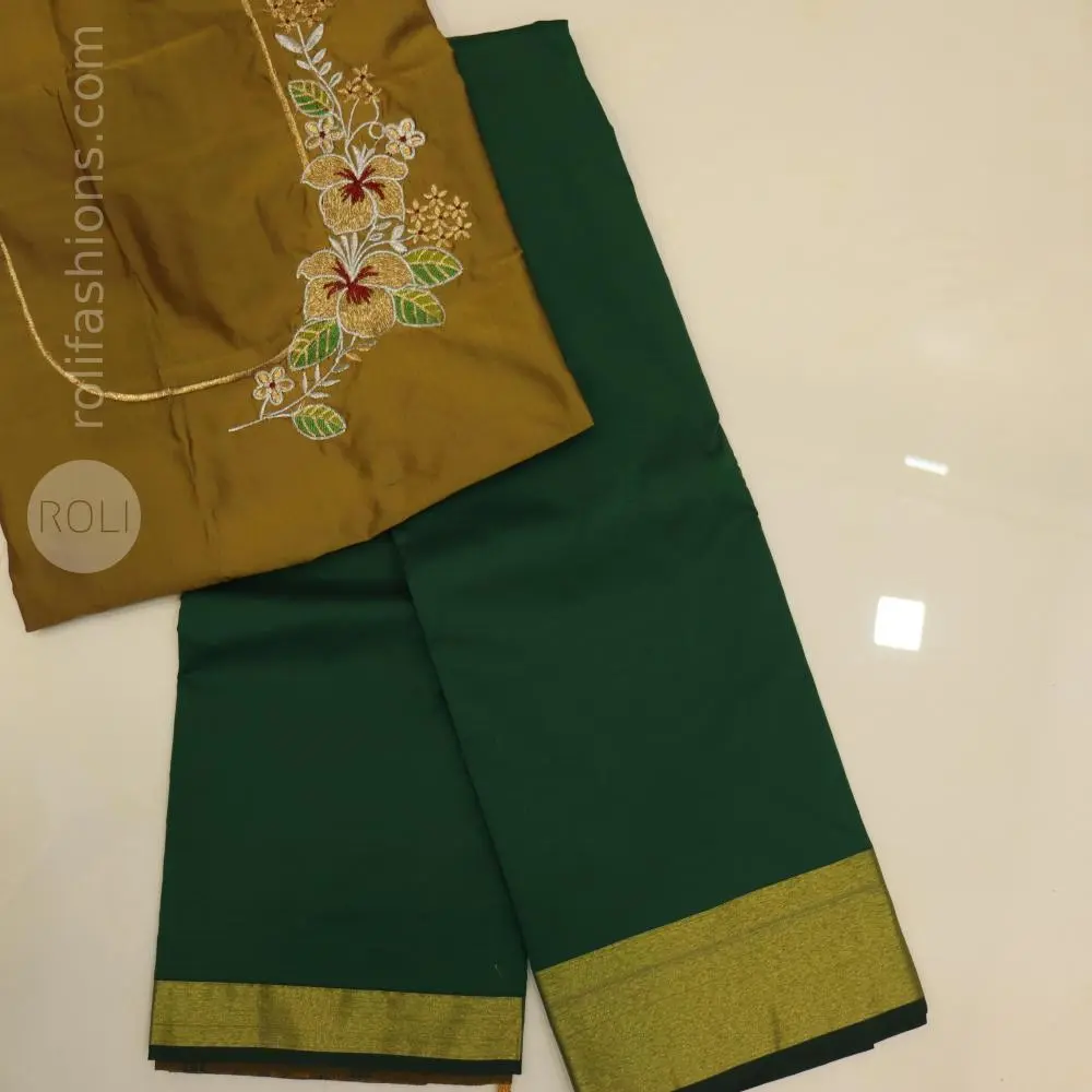 Bottle green saree with dried mehendhi blouse