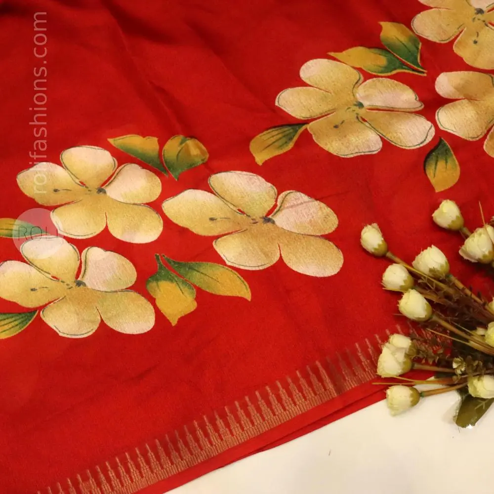 Vibrant red saree with floral motif