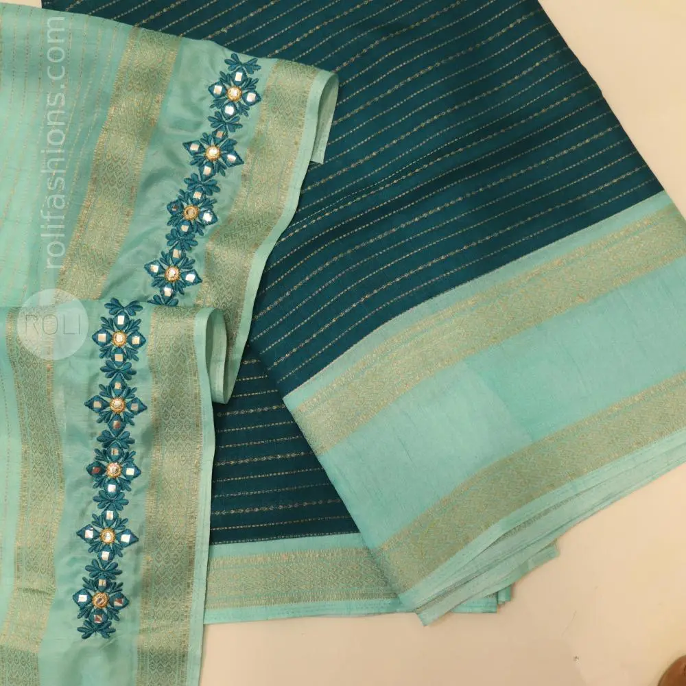 Turquoise blue saree with Teal green border