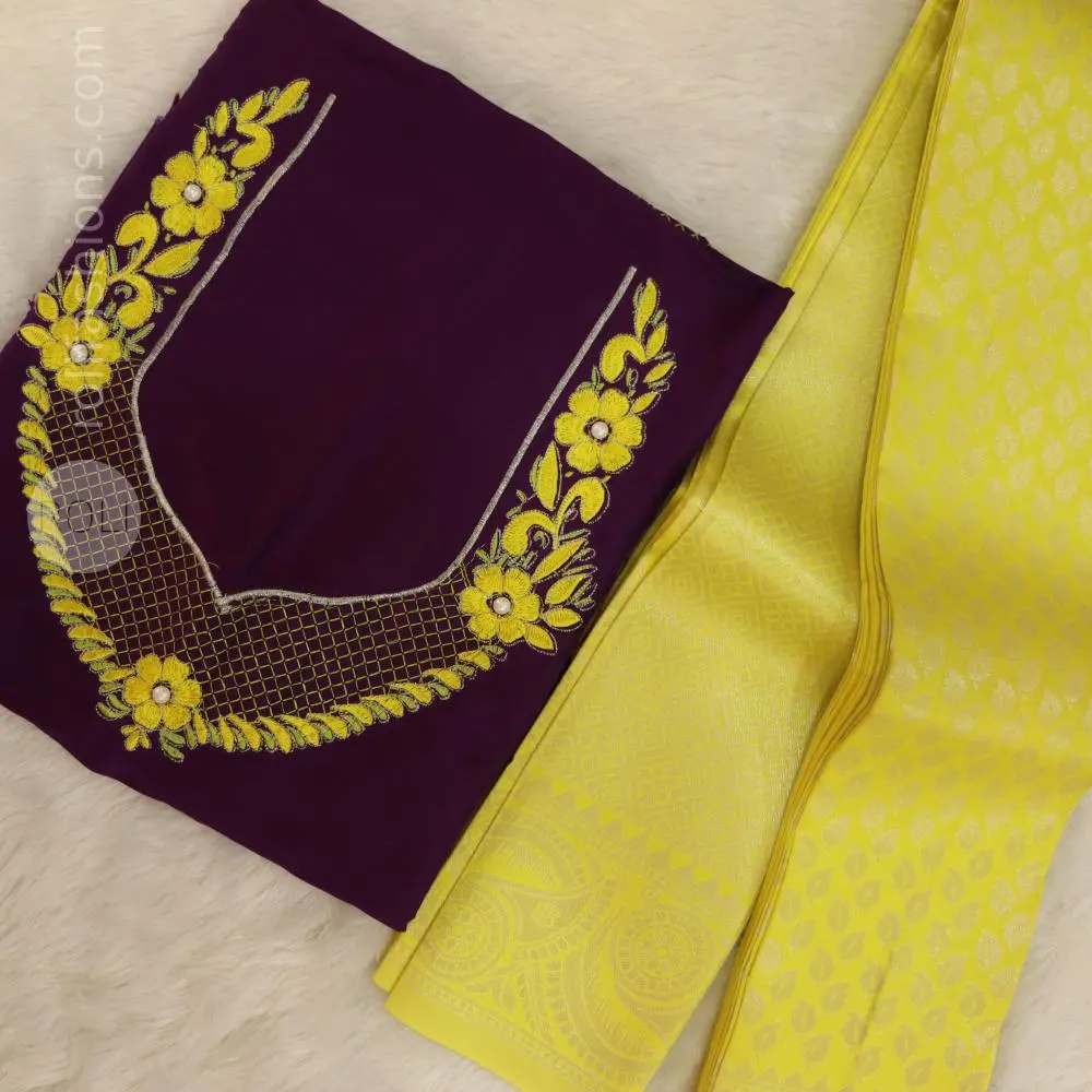 Yellow saree with deep purple blouse