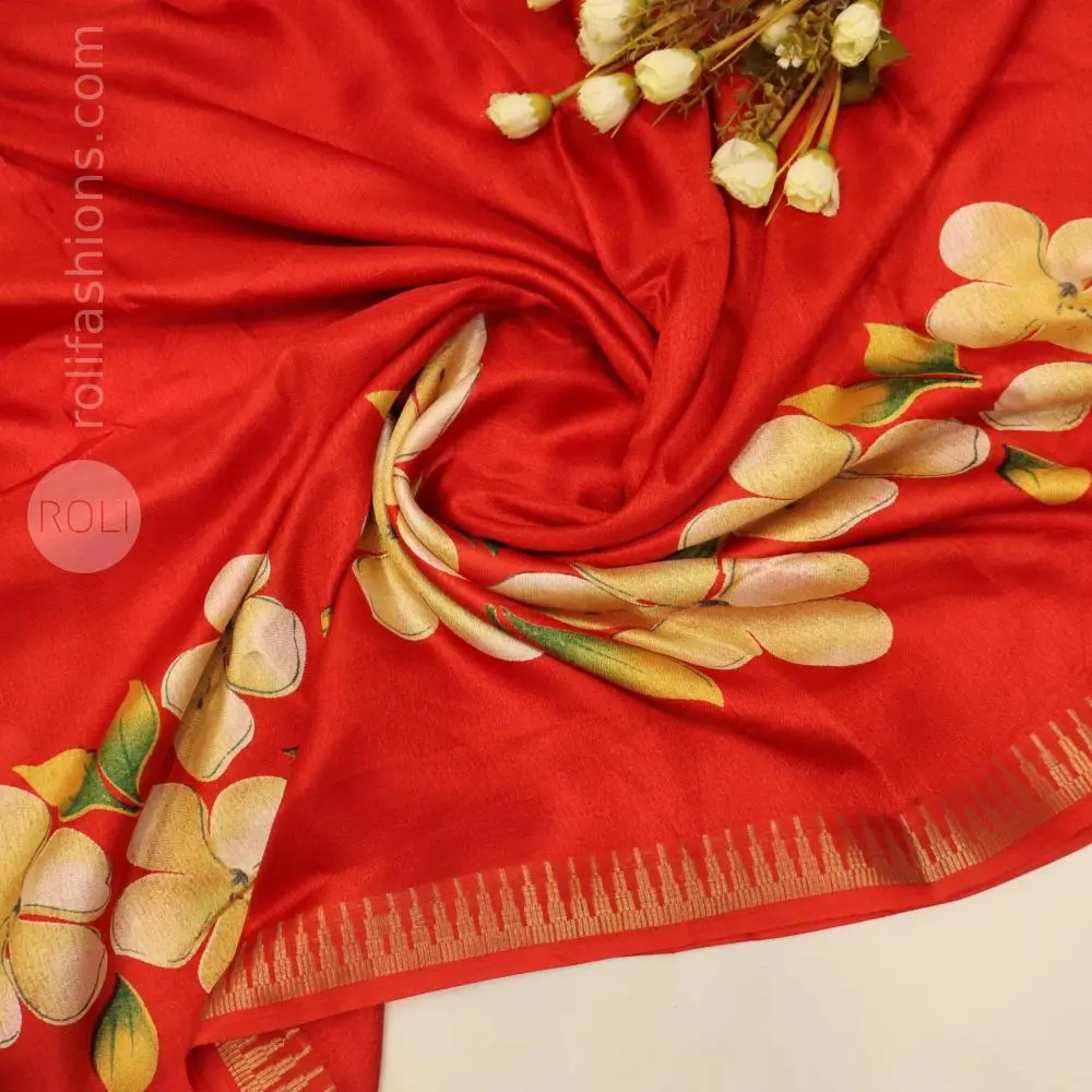Vibrant red saree with floral motif