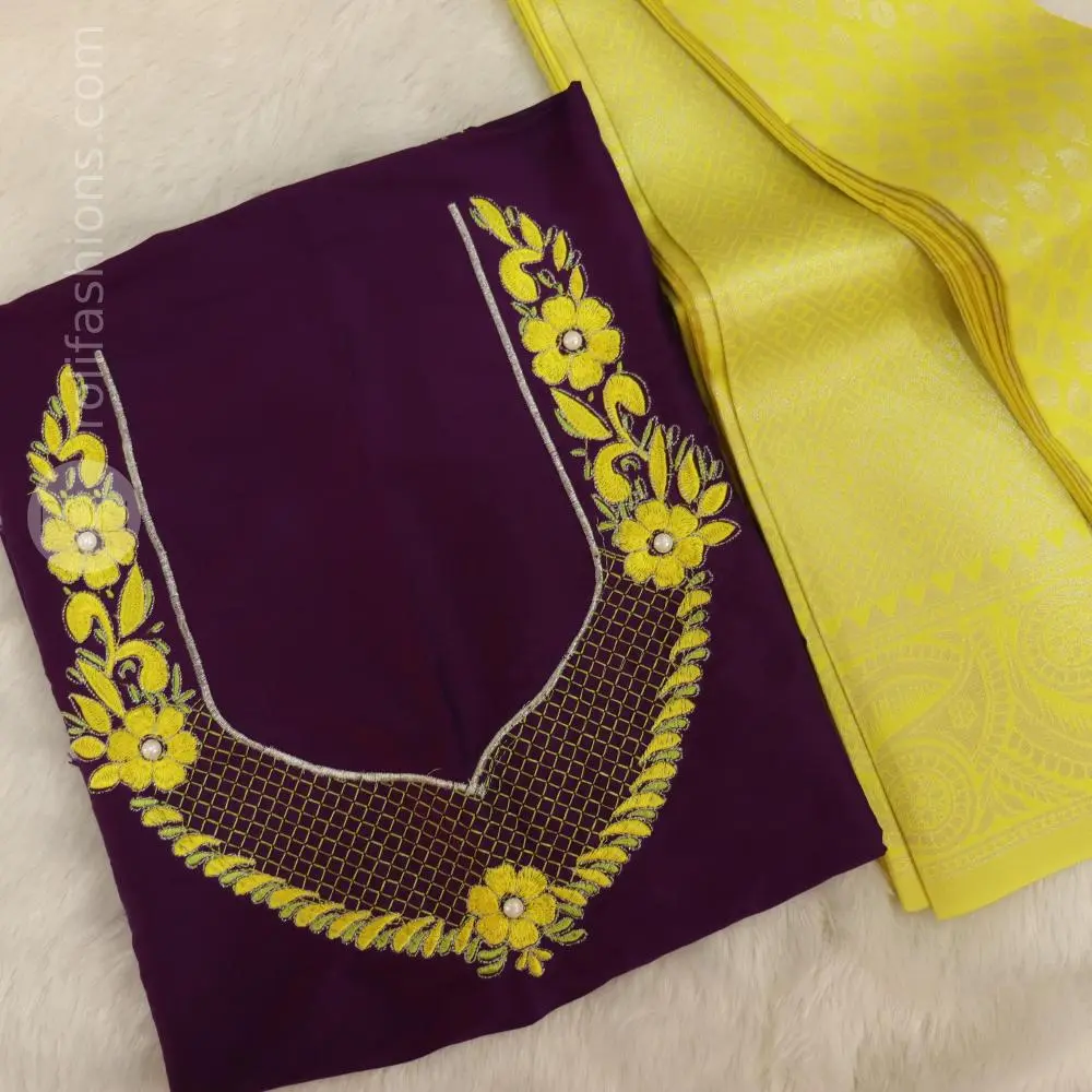 Yellow saree with deep purple blouse