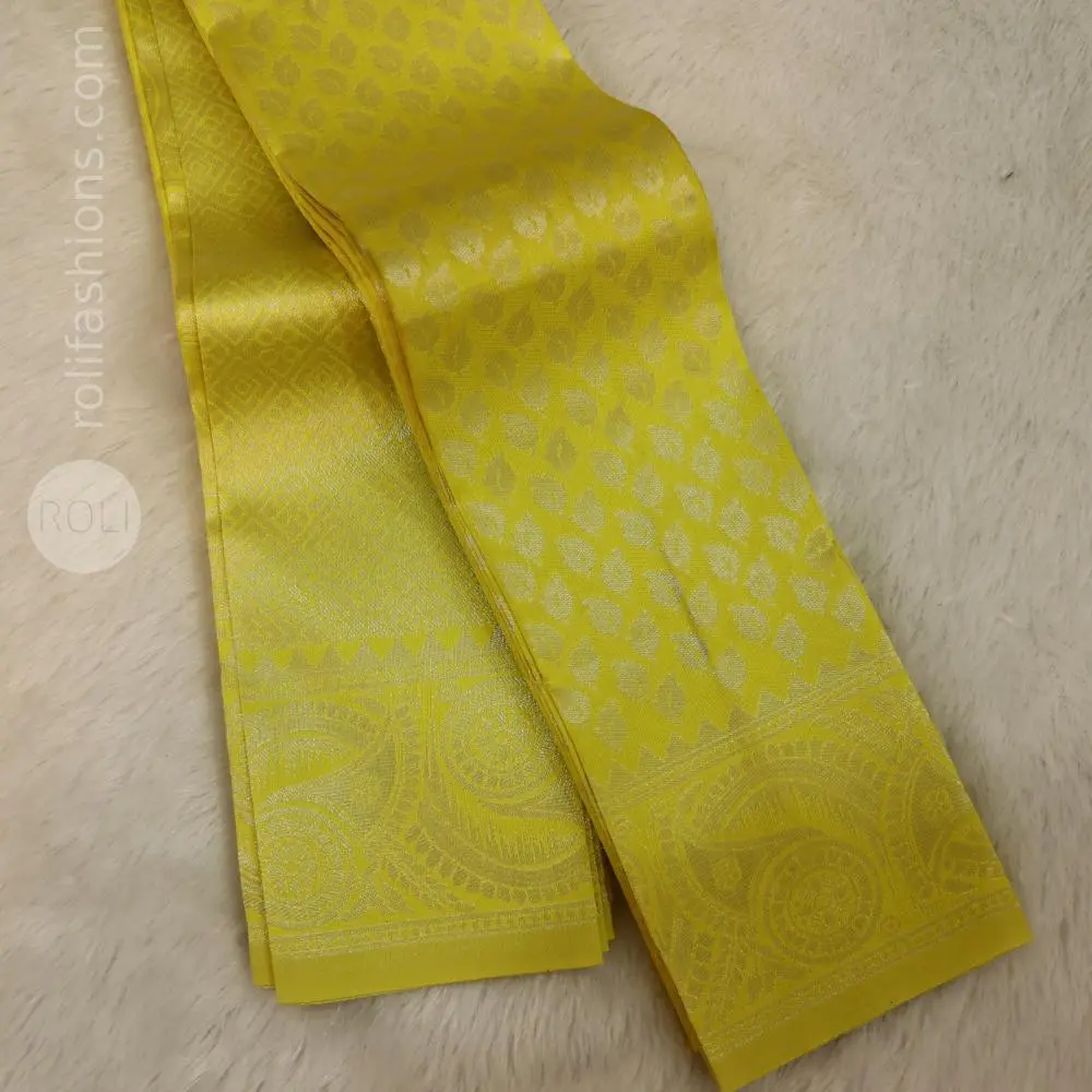 Yellow saree with deep purple blouse