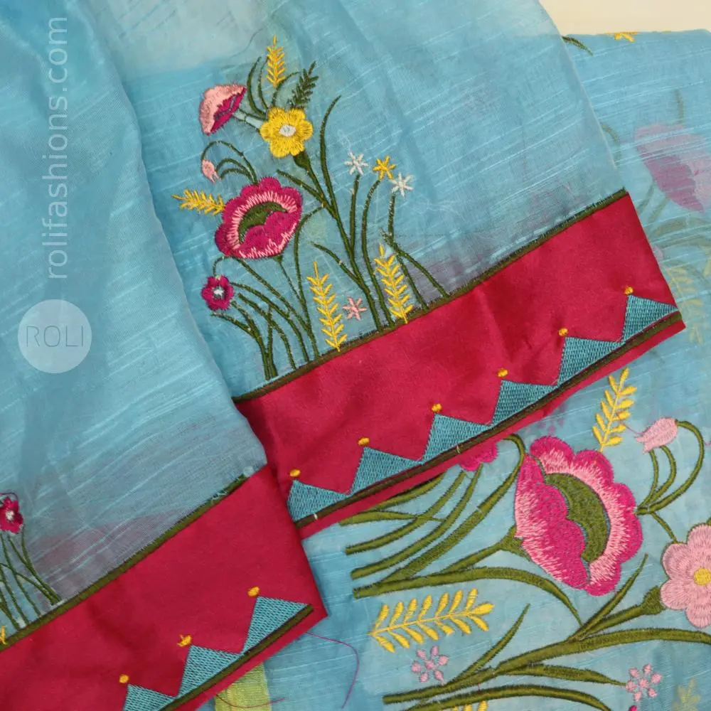 Nevy blue saree in floral embroidery and patterned with pink fabric