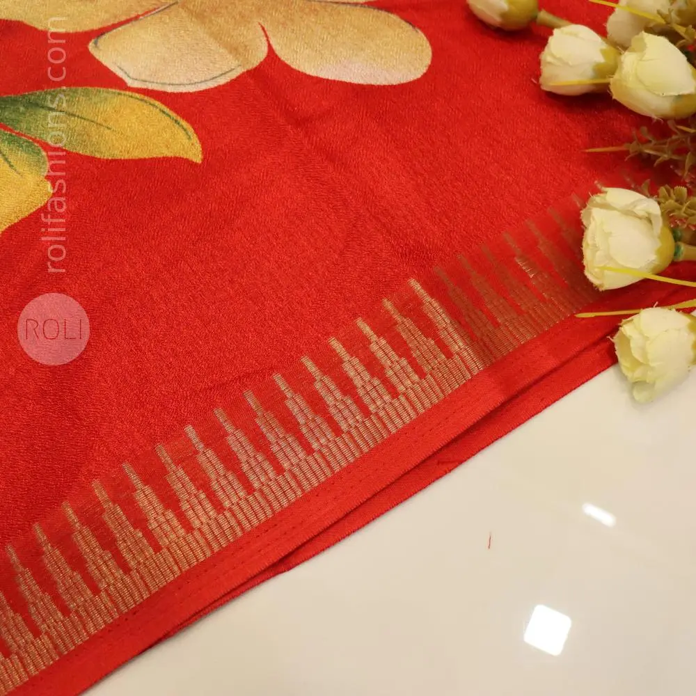 Vibrant red saree with floral motif