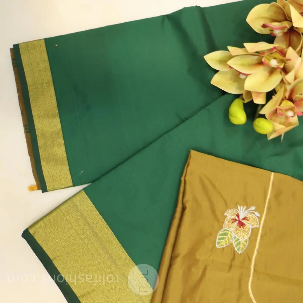 Bottle green saree with dried mehendhi blouse