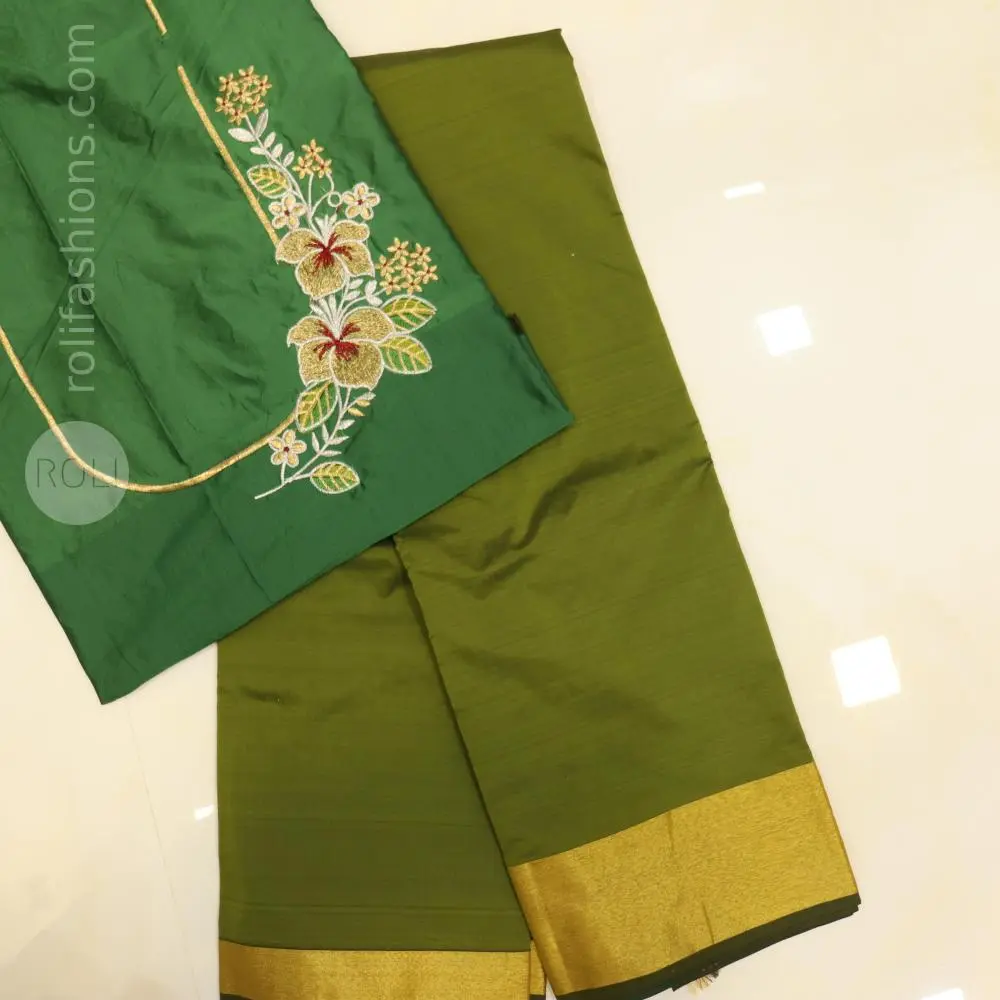 Light green saree with bottle green blouse and pallu