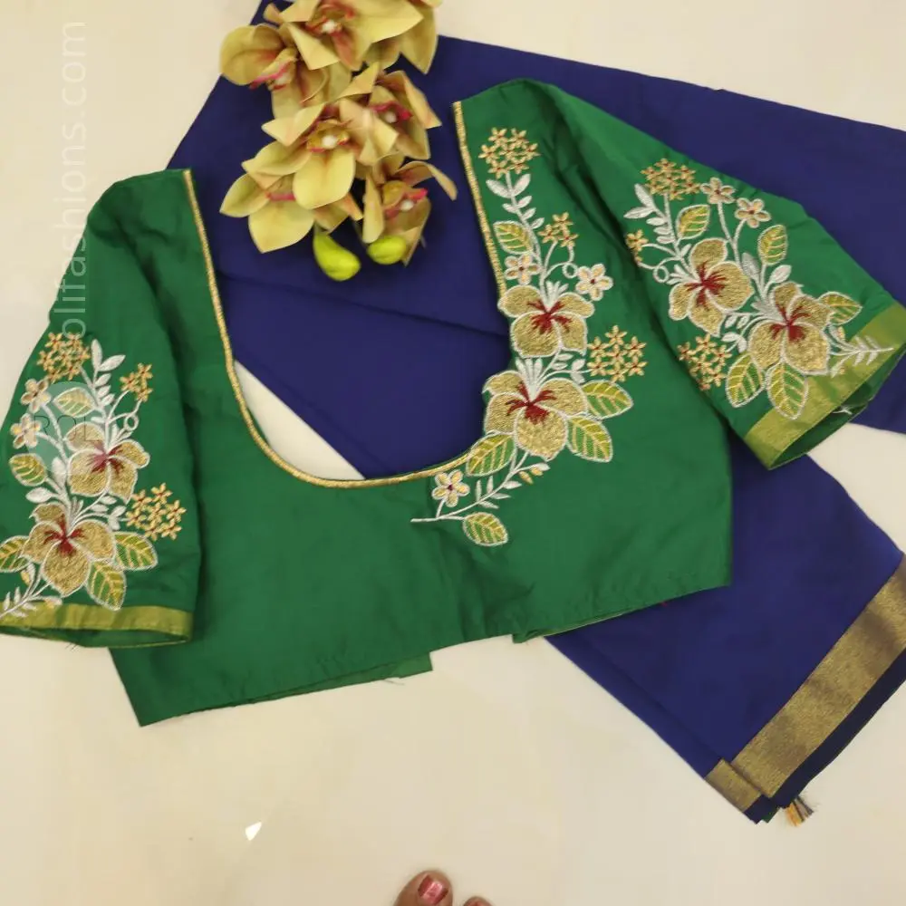 Blue with golden zari woven border and green blouse and pallu