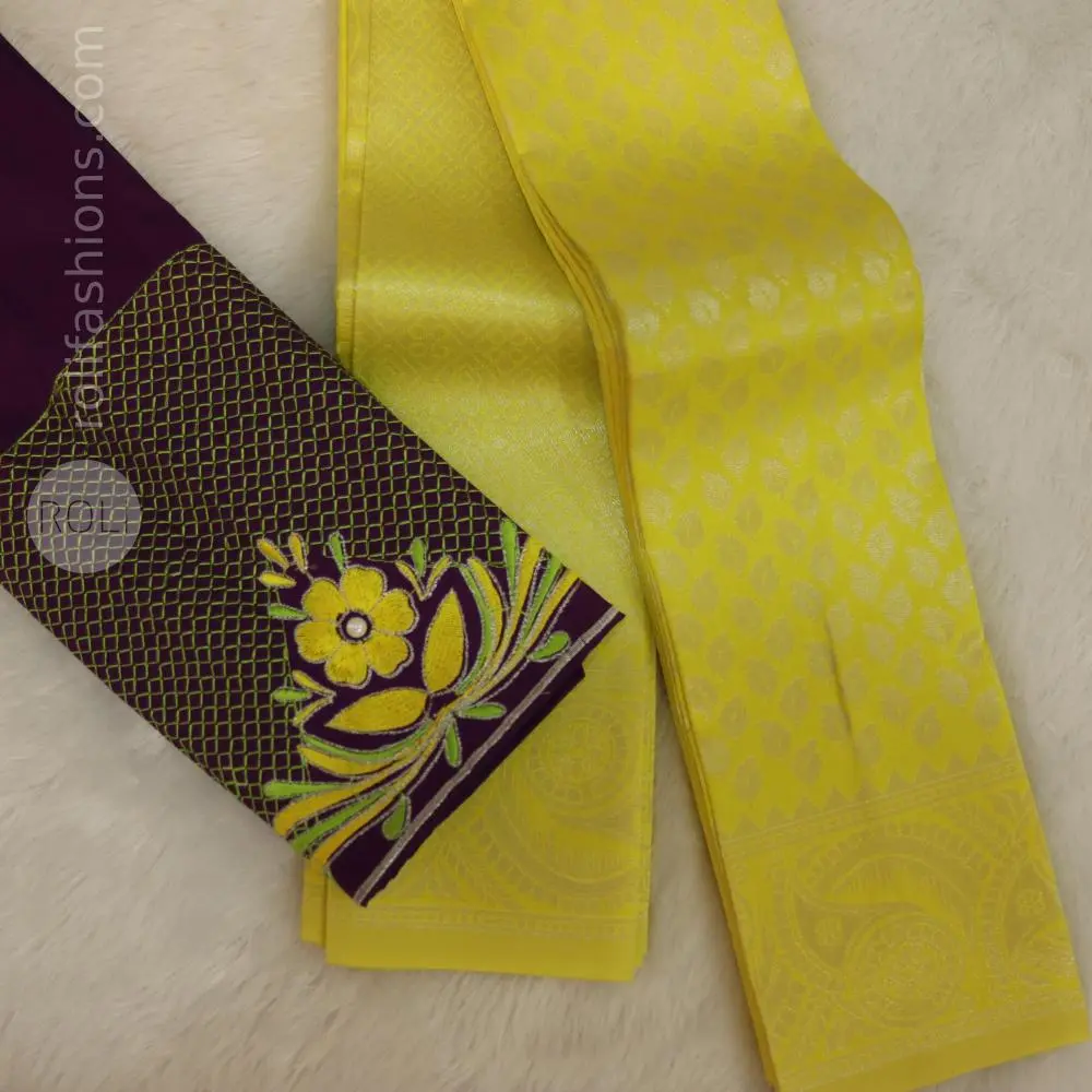 Yellow saree with deep purple blouse