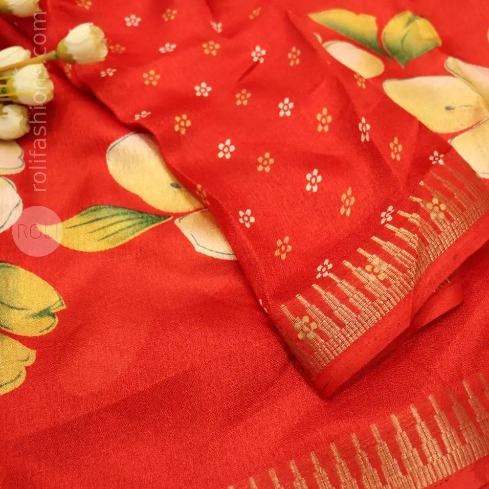 Vibrant red saree with floral motif