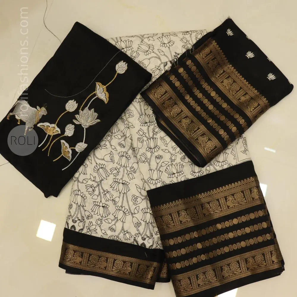 Stunning celebrity black with white saree