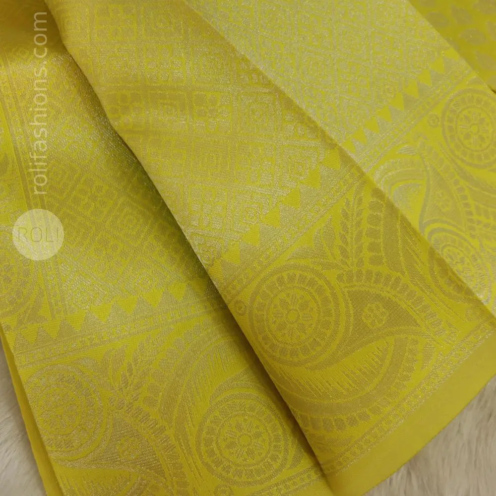 Yellow saree with deep purple blouse