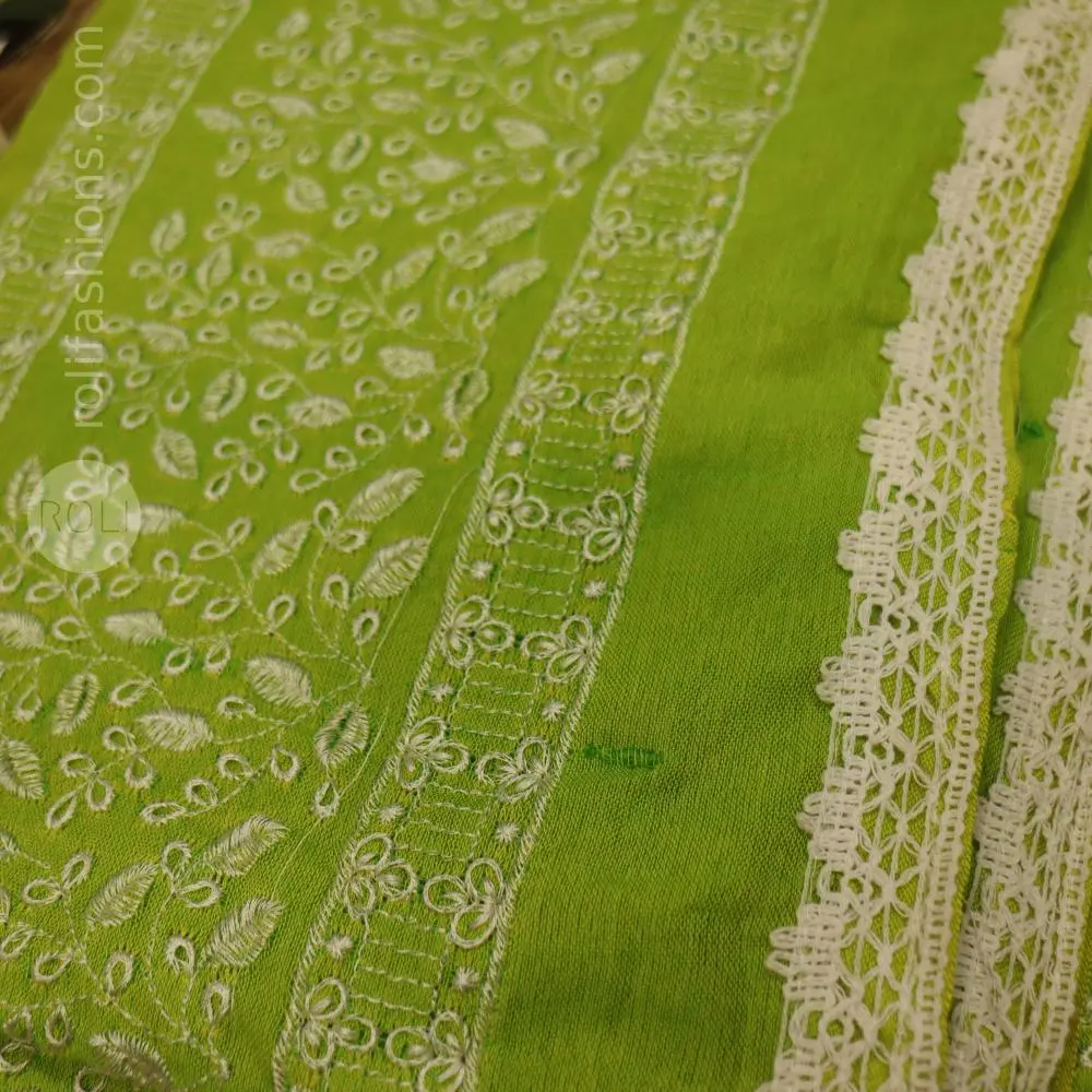 Parrot green saree with lace edges and allover embroidery