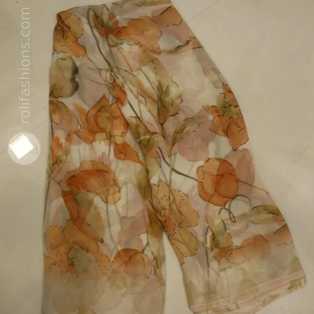 Different shades of brown flowers on a white base saree