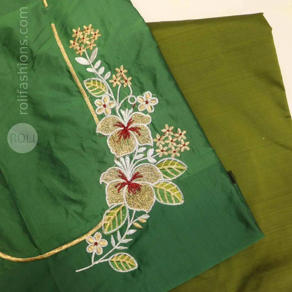 Light green saree with bottle green blouse and pallu